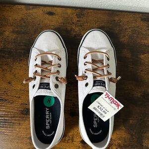Sperry White Canvas Slip-On Sneakers with Tan Laces and Black Trim